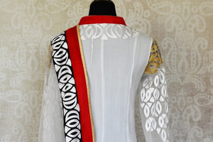 Buy white embroidered net Anarkali suit online in USA with red and black border from Pure Elegance. Choose from a range of exclusive Indian designer suits, wedding dresses, Anarkali suits in beautiful styles and designs from our Indian fashion store in USA and flaunt your tasteful sartorial choices on special occasions.-back