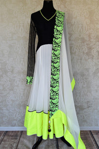 Shop black and white embroidered net floor length Anarkali suit online in USA with green border from Pure Elegance. Choose from a range of exclusive Indian designer suits, wedding dresses, Anarkali suits in beautiful styles and designs from our Indian fashion store in USA and flaunt your tasteful sartorial choices on special occasions.-full view