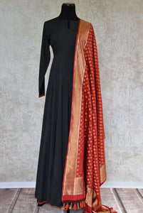 Black solid Suit with red trim on edge and Banarasi dupatta. Perfect suit for Indian parties and festivals.-Full view