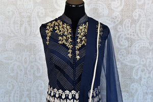 Shop Navy blue Indian ready made embroidered double layered anarkali suit with dupatta online and in store at Pure Elegance, perfect for parties and festivals.-embroidered neck view
