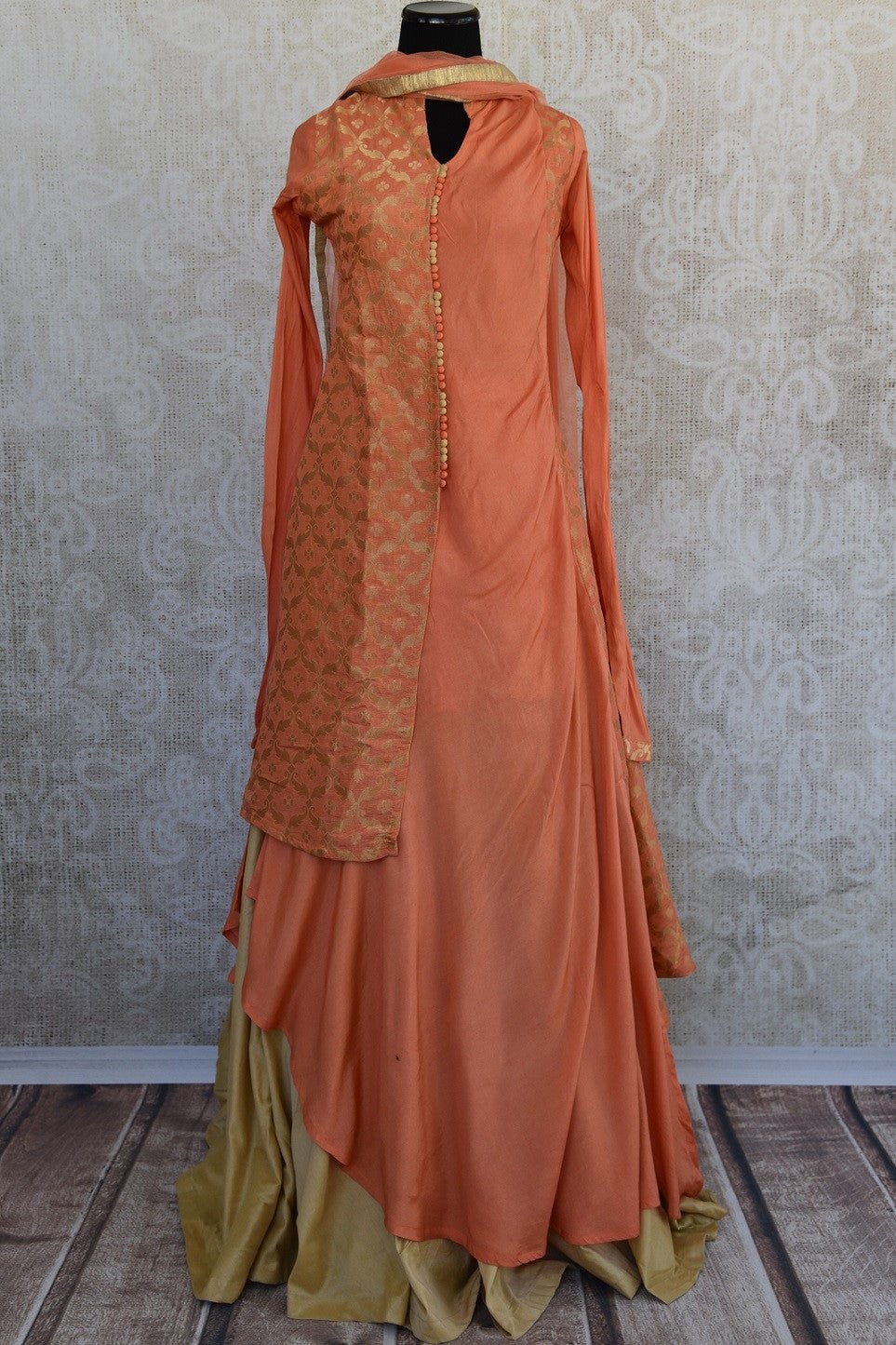 Orange silk suit skirt set comes with scarf available online and in store for sale.This piece is indo-western chick style Indian party wear for all occasions.-full view