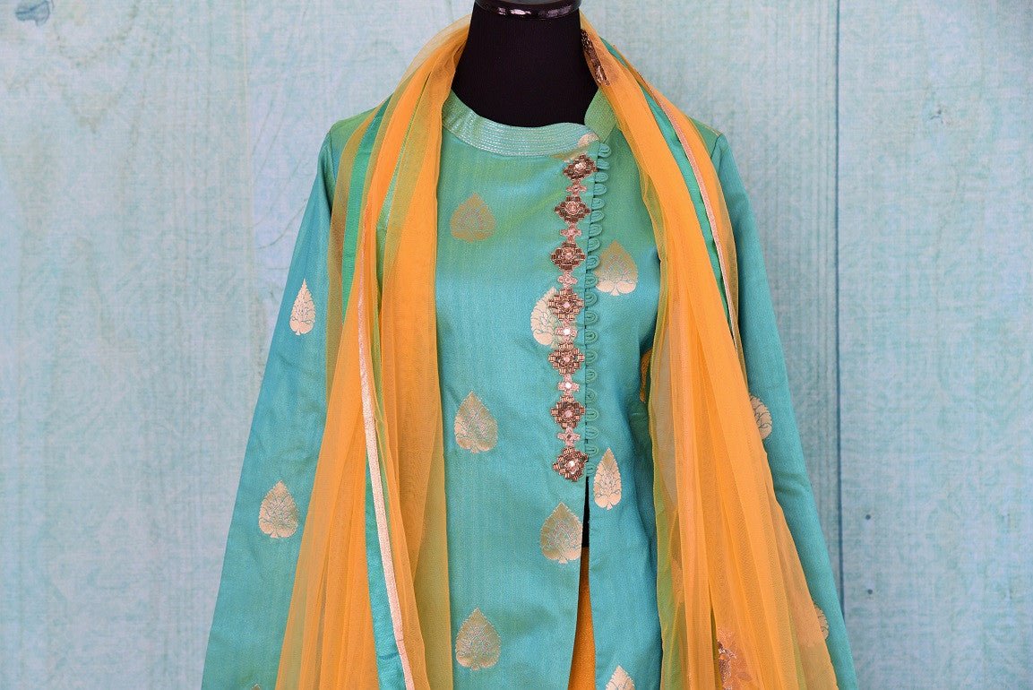 Designer Green raw silk kurta with big buta and plain yellow skirt with gold border set comes with classy net dupatta at pure elegance in Edison,New Jersey USA.- details