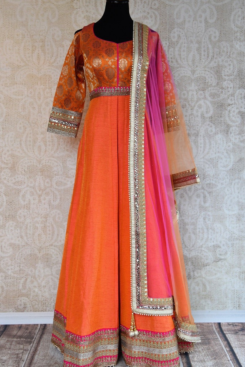 Buy this elegant and eye catching orange banarasi raw silk floor length indian suit with dupatta from pure elegance store. Great for parties and festive occasions- Full View