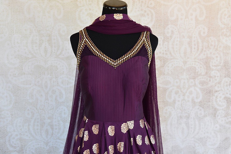 Beautiful designer purple with buta all over banarasi anarkali suit with net dupatta. Perfect for wedding parties.-neck design