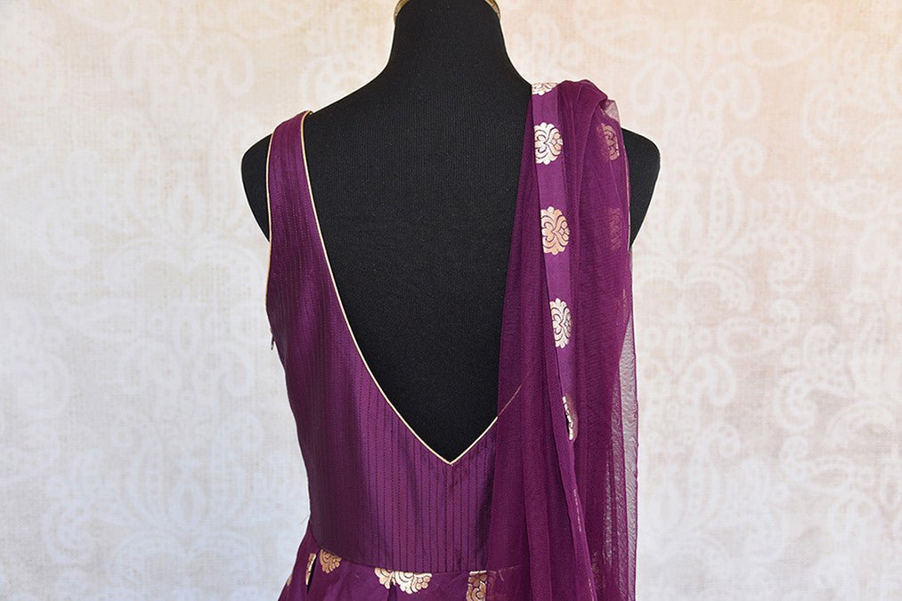 Beautiful designer purple with buta all over banarasi anarkali suit with net dupatta. Perfect for wedding parties.-back