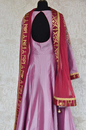 Buy Purple/lavender Anarkali with maroon banarasi border, embroidery on neck line and sleeves . This Indian attire comes with net dupatta-back