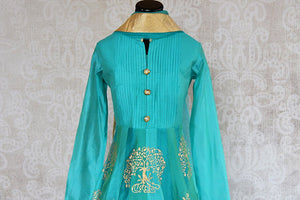 Green/turquoise Anarkali Suit with block print available. A classic suit and perfect party wear.-close up