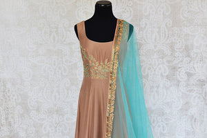 Brown chanderi anarkali suit with turquoise thread embroidery available at Indian women clothing store pure elegance in USA. Perfect party suit for weddings -top view