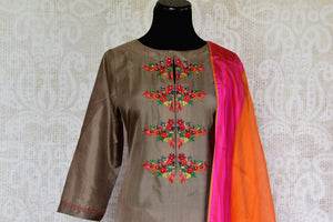 Buy Elegant Brown Silk Suit with Orange Dupatta online from Pure Elegance Store. Beautiful collection of ethnic Indian Salwar Kameez, Churidar Suits online in USA.-front
