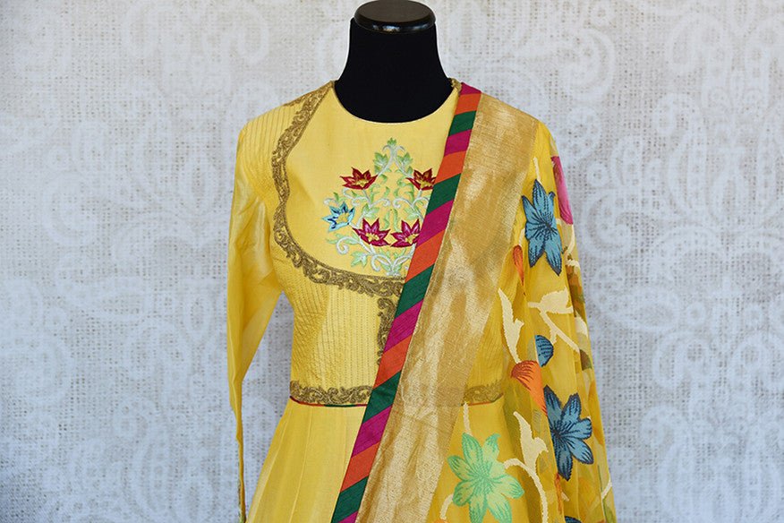 Indian bright yellow floor length thread embroidered anarkali with beautiful floral weaved dupatta. Perfect in wedding events.-front embroidery
