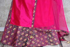 Pink designer silk straight suit with cold shoulder sleeve and it comes with banarasi palazzo pants and net dupatta.- banarasi palazzo