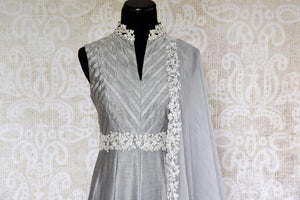 Buy stylish grey Anarkali suit online in USA with embroidery. Pure Elegance store brings an exquisite range of Indian designer suits online for women in USA.-front