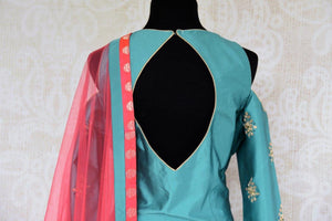 Buy blue kundan work kurta with red Banarasi palazzo online in USA . Pure Elegance store brings exquisite range of Indian dresses online for women in USA. Shop now.-back