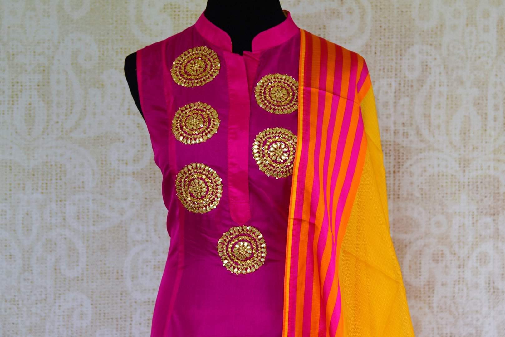 Buy pink gota patti embroidered silk suit online from Pure Elegance with dupatta. Our fashion store brings stunning Indian salwar suits in USA for women for every occasion.-top