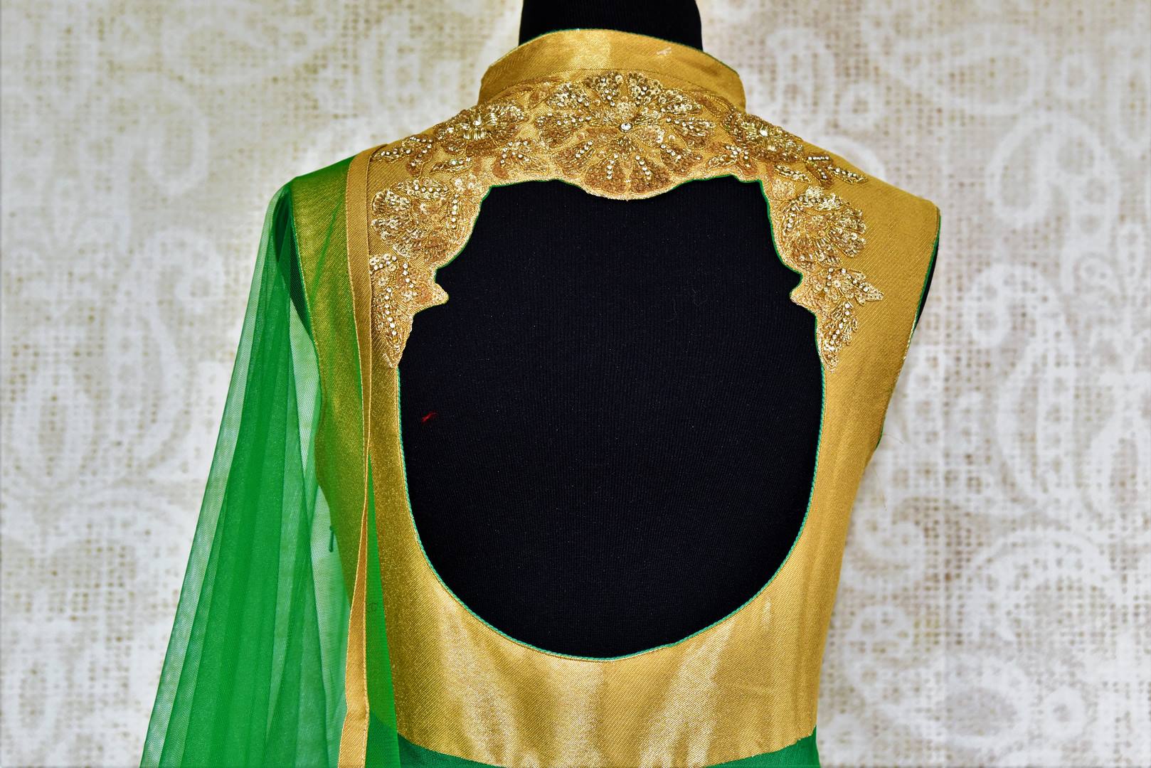 Buy green and gold jute Banarasi embroidered Anarkali suit online in USA. Browse through a stunning range of Indian Anarkali suits at Pure Elegance online store.-top back
