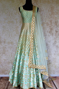 Buy mint green applique silk Anarkali suit online from Pure Elegance with dupatta. Our fashion store brings stunning Indian designer Anarkali suits in USA for weddings.-full view
