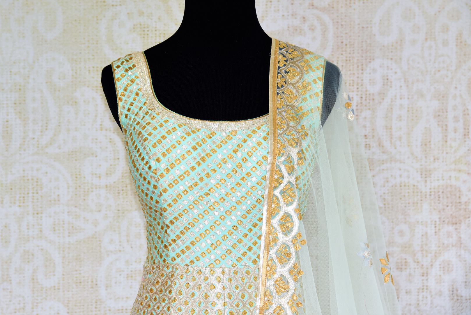 Buy mint green applique silk Anarkali suit online from Pure Elegance with dupatta. Our fashion store brings stunning Indian designer Anarkali suits in USA for weddings.-top front