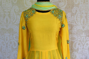 Buy yellow embroidered chanderi Anarkali suit online in USA. Pure Elegance store brings exquisite range of  Indian designer Anarkali suits in USA for every occasion.-top front