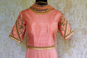 Buy pink embroidered georgette and raw silk Anarkali suit online in USA. Pure Elegance store brings exquisite range of designer Indian Anarkali suits in USA for every occasion.-top front