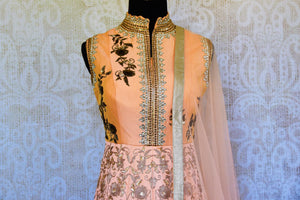 Buy peach raw silk embroidered Anarkali suit online in USA with dupatta. Pure Elegance fashion store brings an exclusive range of Indian Anarkali suits in USA for women.-top front