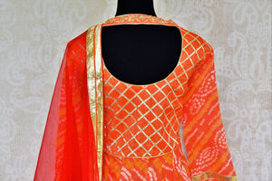 Buy orange bhandej gota patti Anarkali suit online in USA with dupatta. Pure Elegance store brings a stunning range of ethnic Indian Anarkali suits in USA for every occasion.-top back