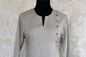 Buy grey embroidered chanderi suit online in USA. Pure Elegance clothing store brings an exquisite range of Indian designer suits for online shopping in USA. -top