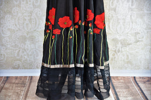 Buy black embroidered silk and net dress online in USA. Pure Elegance clothing store brings an exquisite range of Indian designer formal dresses online in USA. Shop online-panel