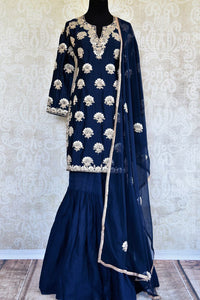 Buy navy blue embroidered cotton linen sharara suit with dupatta online in USA. Pure Elegance clothing store brings an exquisite range of Indian dresses in USA. -full view
