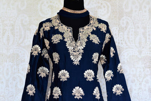 Buy navy blue embroidered cotton linen sharara suit with dupatta online in USA. Pure Elegance clothing store brings an exquisite range of Indian dresses in USA. -top