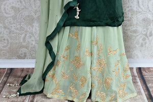 Buy beautiful embroidered green chanderi kurta with palazzo online in USA. The attire is beautifully adorned with kundan work which makes it so exquisite. Get floored by an exclusive collection of Indian formal dresses in USA available at Pure Elegance clothing store or shop online.-palazzo