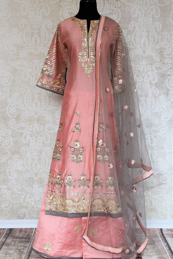 Buy pink gota pattu embroidery chanderi suit with palazzo online in USA. Radiate ethnic elegance at special occasions with this absolutely striking Indian attire. Add more such traditional Indian designer suits to your wardrobe, available at Pure Elegance clothing store in USA for women or you can also shop online. -full view