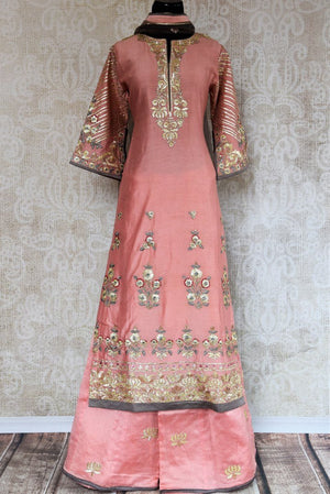 Buy pink gota pattu embroidery chanderi suit with palazzo online in USA. Radiate ethnic elegance at special occasions with this absolutely striking Indian attire. Add more such traditional Indian designer suits to your wardrobe, available at Pure Elegance clothing store in USA for women or you can also shop online. -full view 2