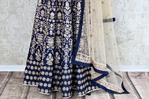 Buy royal blue embroidered floor length Anarkali suit online in USA. The beautiful ensemble is a stunning choice for weddings and parties. Get floored by an exquisite collection of Indian wedding dresses in USA available at Pure Elegance clothing store or shop online.-details