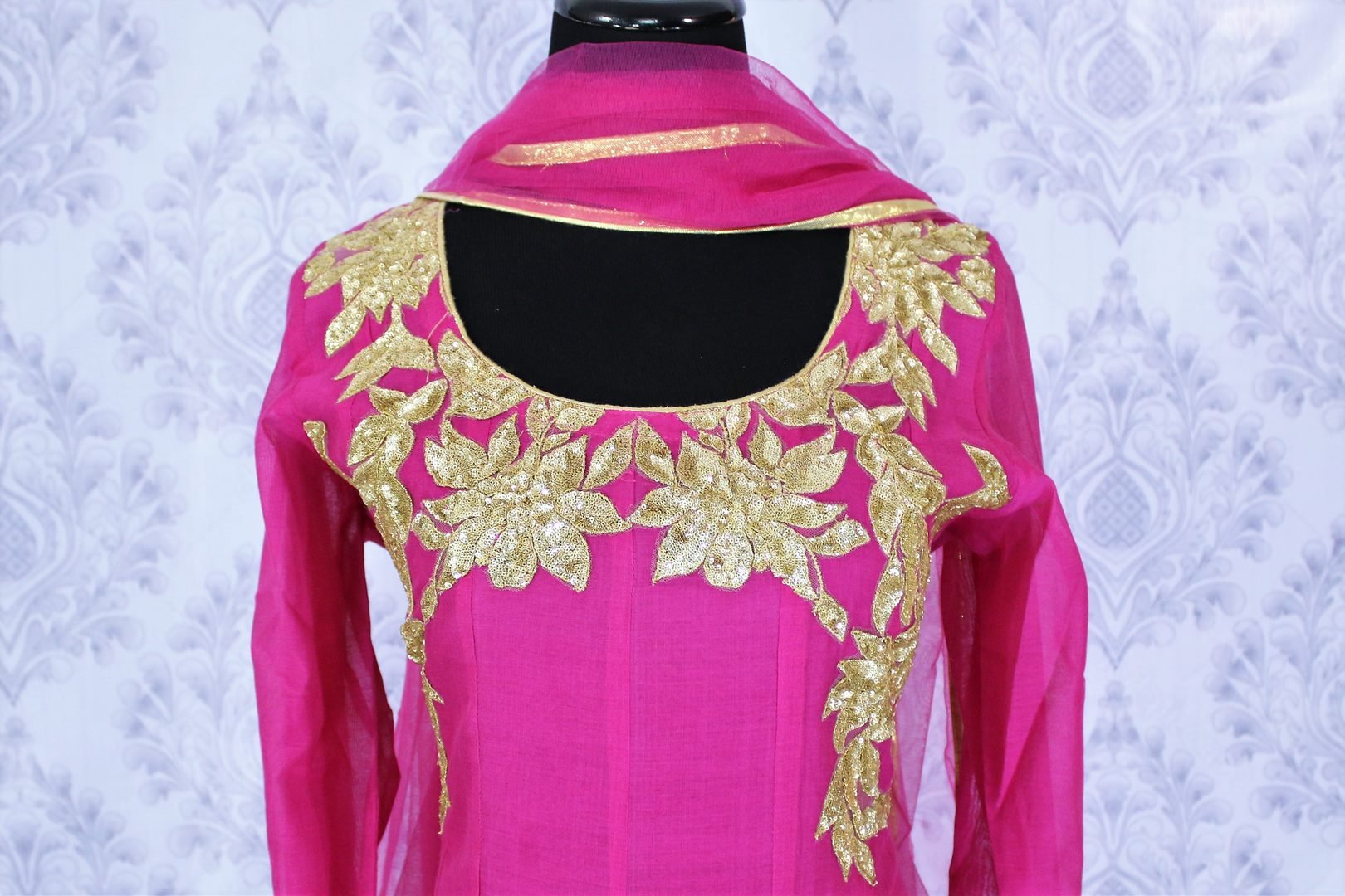 Buy pink color embroidered churidaar suit with dupatta online in USA and bring your ethnic look alive with this elegant Indian outfit at special occasions. Add latest Indian salwar suits to your ethnic wardrobe available at Pure Elegance Clothing store in USA for women or you can also shop online.-front