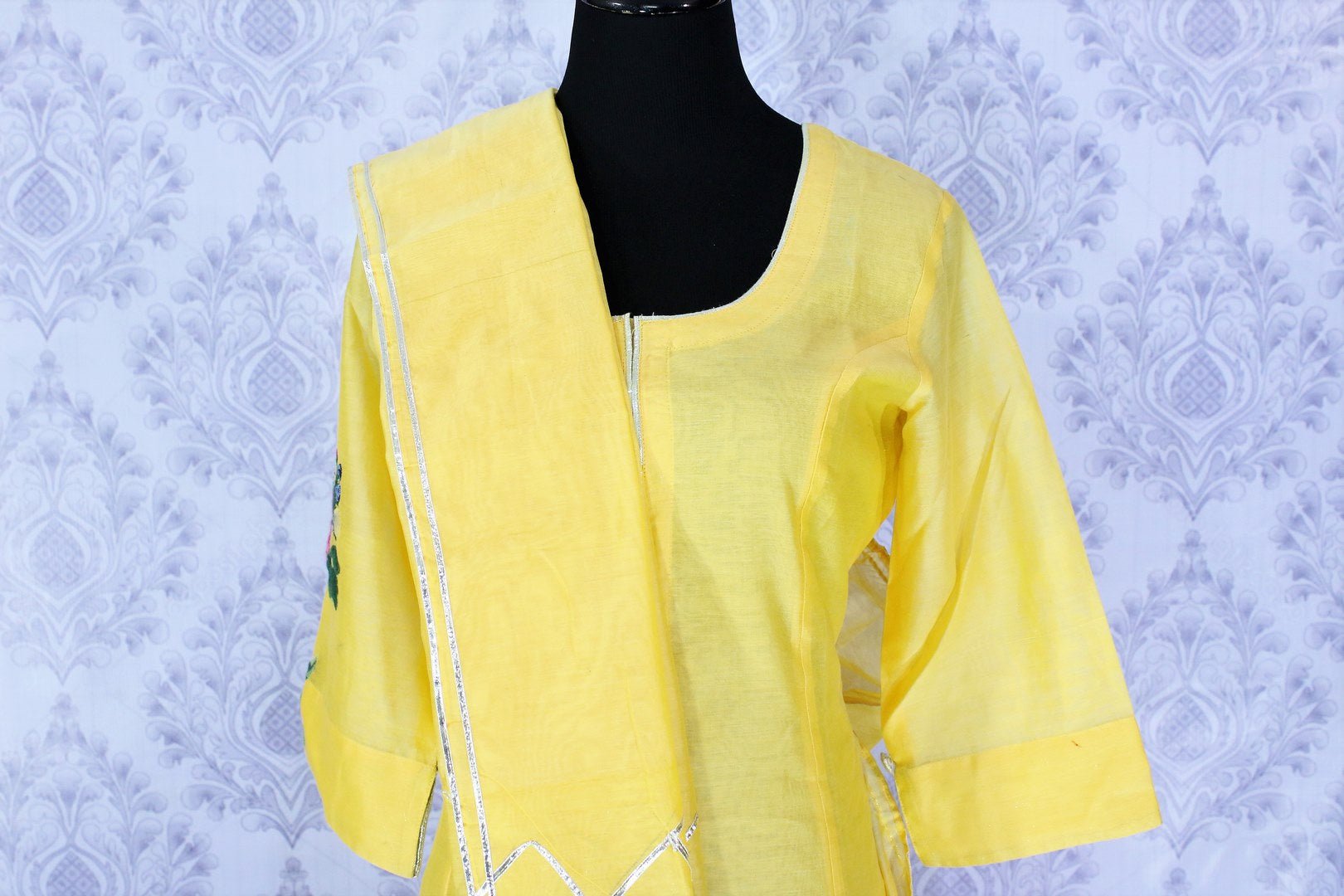 Lemon yellow embroidered sharara suit with dupatta buy online in USA. A beautiful choice for a striking ethnic Indian look at special occasions. Add latest Indian designer dresses to your ethnic wardrobe available at Pure Elegance Clothing store in USA for women.-front