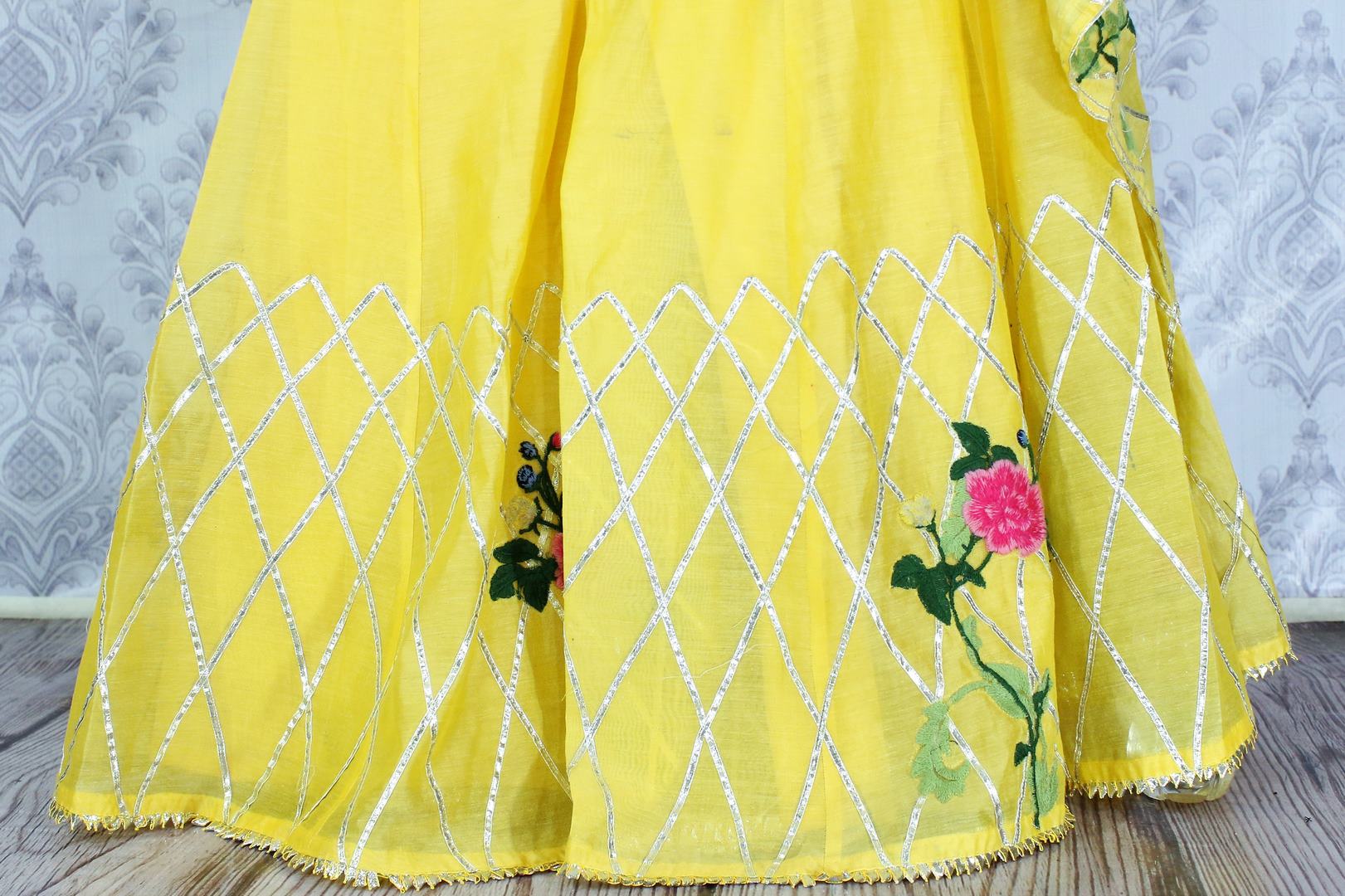 Lemon yellow embroidered sharara suit with dupatta buy online in USA. A beautiful choice for a striking ethnic Indian look at special occasions. Add latest Indian designer dresses to your ethnic wardrobe available at Pure Elegance Clothing store in USA for women.-bottom