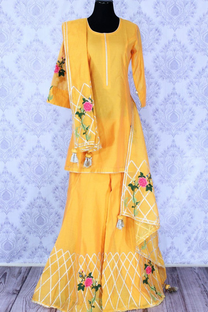 Beautiful yellow embroidered sharara suit with dupatta buy online in USA. A stunning choice for a striking ethnic Indian look at special occasions. Add latest Indian designer suits to your ethnic wardrobe available at Pure Elegance Clothing store in USA for women.-full view