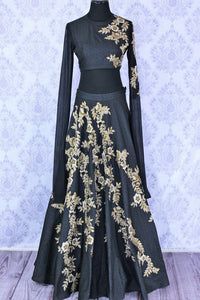 Gorgeous black embroidered designer lehenga buy online in USA. A stunning choice for a striking ethnic Indian look at weddings and special occasions. Dazzle in latest Indian designer wedding lehengas available at Pure Elegance Clothing store in USA for women.-full view