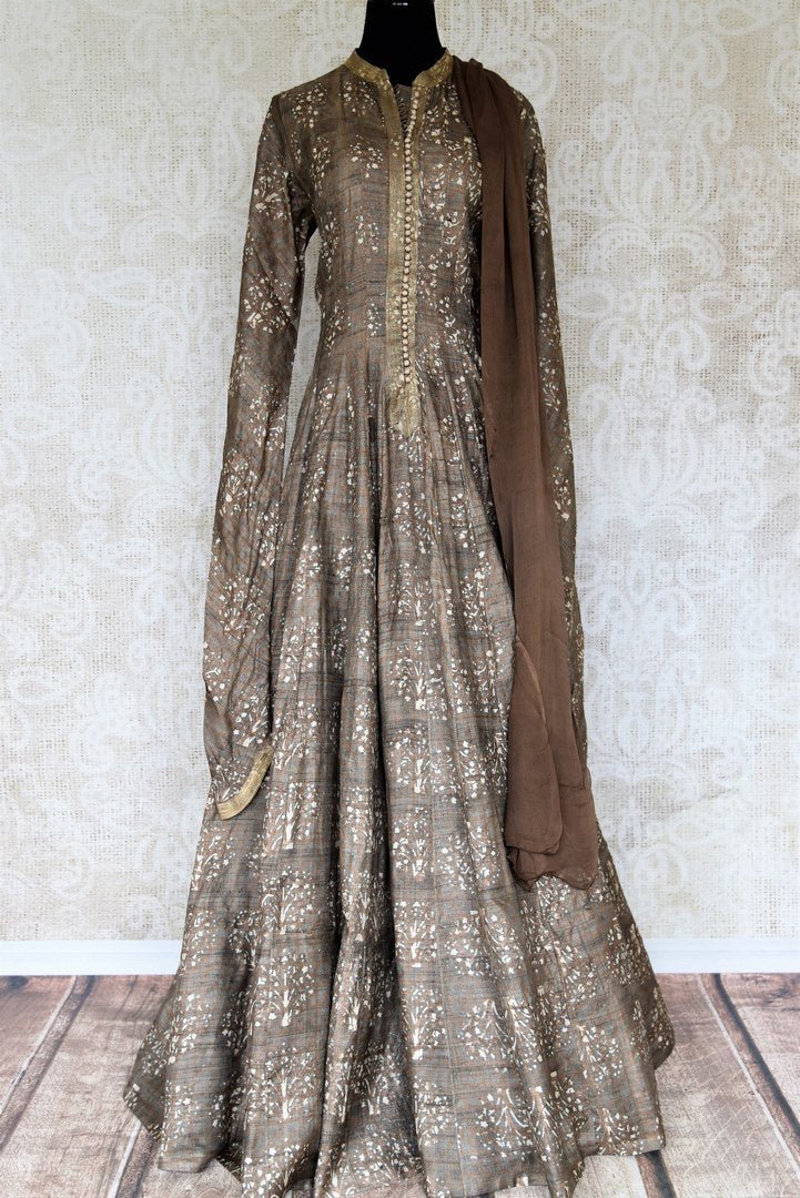 Buy brown printed tussar silk floor length Anarkali suit online in USA with dupatta. The elegant suit is perfect for a classic Indian ethnic look. Make your Indian clothing collection exquisite with beautiful Indian designer Anarkali suits available at Pure Elegance clothing store in USA or shop online.-full view