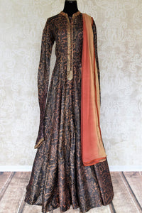 Buy dark brown printed tussar silk floor length Anarkali suit online in USA with dupatta. The elegant suit is perfect for a classic Indian ethnic look. Make your Indian clothing collection exquisite with beautiful Indian Anarkali suits available at Pure Elegance clothing store in USA or shop online.-full view