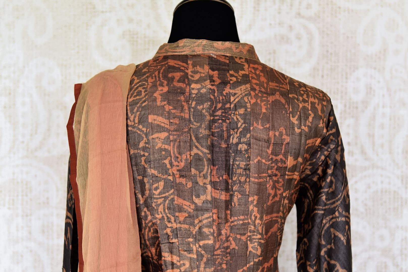 Buy dark brown printed tussar silk floor length Anarkali suit online in USA with dupatta. The elegant suit is perfect for a classic Indian ethnic look. Make your Indian clothing collection exquisite with beautiful Indian Anarkali suits available at Pure Elegance clothing store in USA or shop online.-suit back