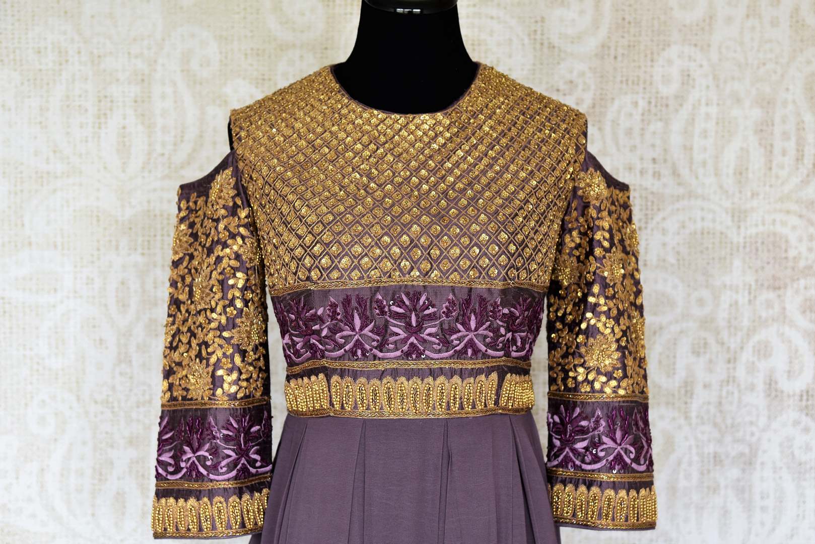 Buy designer purple embroidered georgette gown dress online in USA. Make your Indian clothing collection exquisite with beautiful Indian designer dresses available at Pure Elegance clothing store in USA or shop online.-front