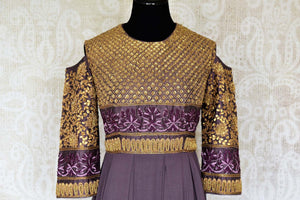 Buy designer purple embroidered georgette gown dress online in USA. Make your Indian clothing collection exquisite with beautiful Indian designer dresses available at Pure Elegance clothing store in USA or shop online.-front