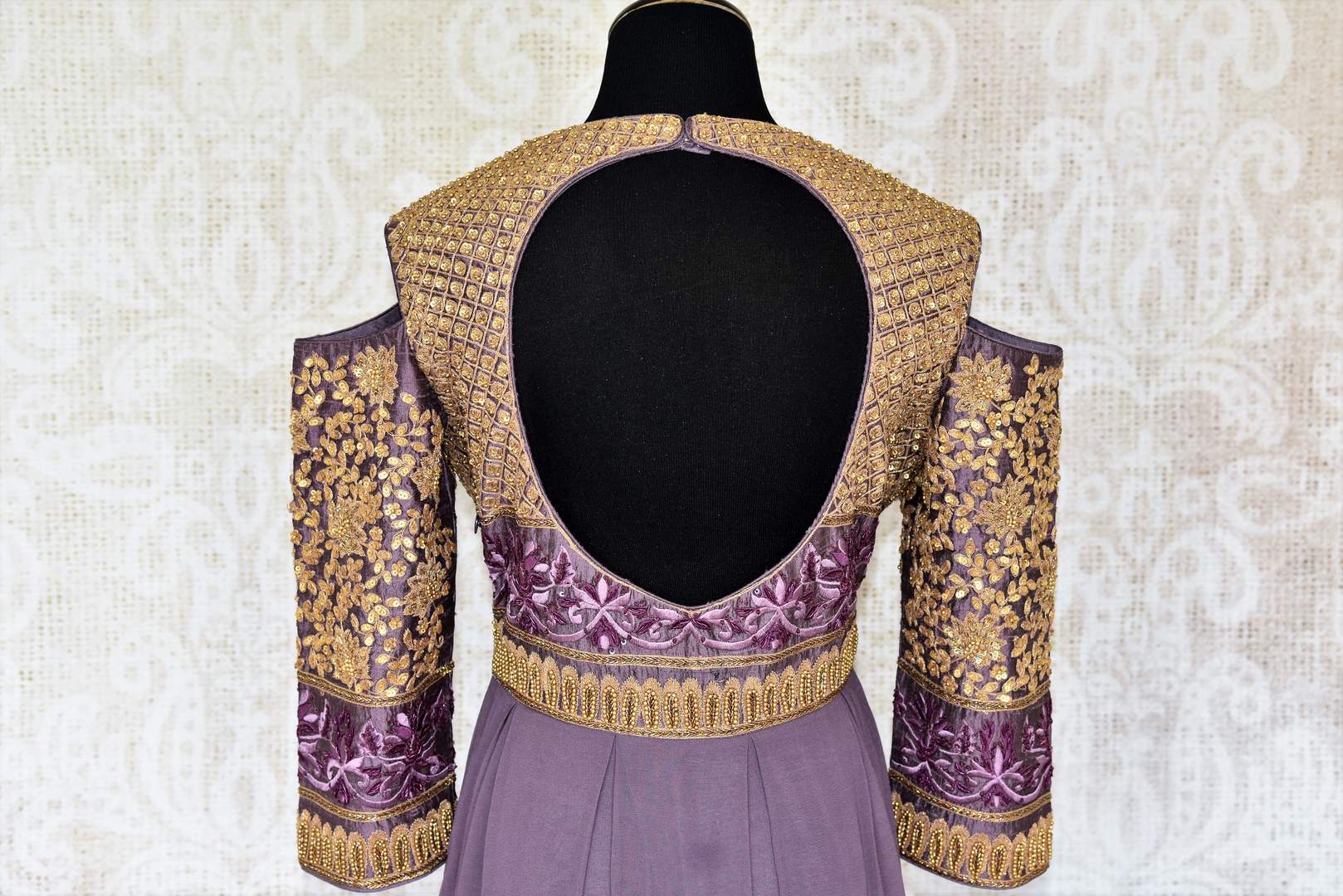 Buy designer purple embroidered georgette gown dress online in USA. Make your Indian clothing collection exquisite with beautiful Indian designer dresses available at Pure Elegance clothing store in USA or shop online.-top back