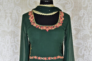 Buy dark green embroidered chiffon georgette Anarkali suit online in USA with dupatta. Make your Indian clothing collection exquisite with beautiful Indian designer dresses, Anarkali suits available at Pure Elegance clothing store in USA or shop online.-suit front