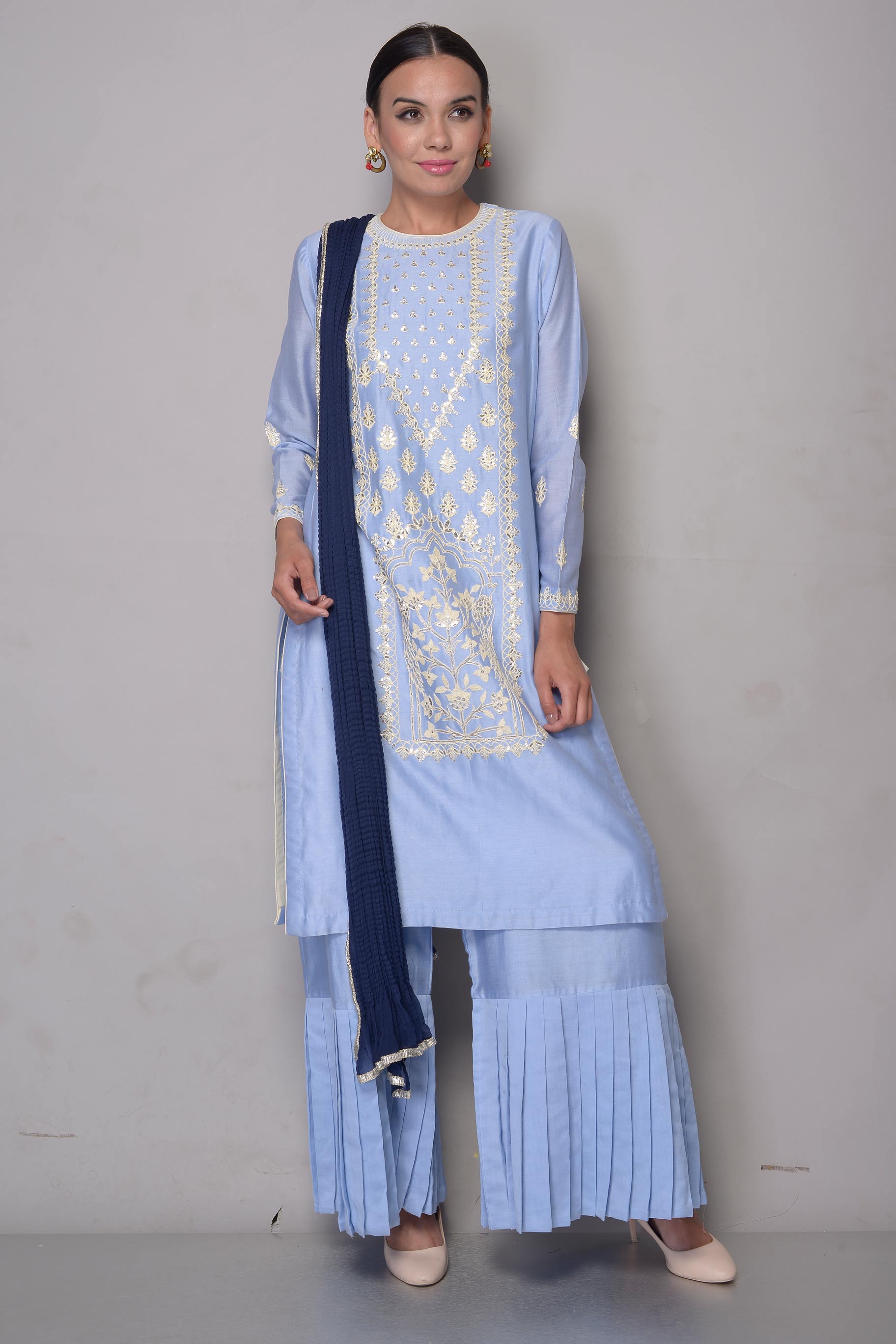 Buy sky blue gota patti chanderi suit with sharara online in USA and navy blue dupatta. To buy more such exquisite Indian designer suits in USA, shop at Pure Elegance Indian fashion store for women in USA or shop online.-full view