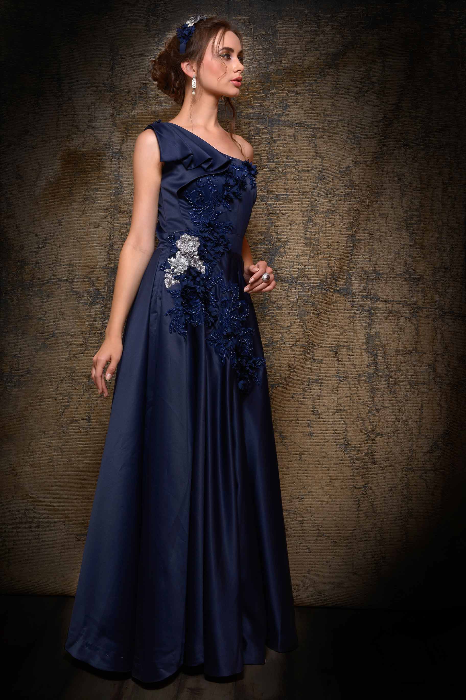 Buy navy blue embroidered one-shoulder satin bridal gown online in USA. Bring glamor to your wedding look with elegant designer wedding gowns, wedding dresses available at Pure Elegance Indian clothing store for women in USA or shop online.-full view
