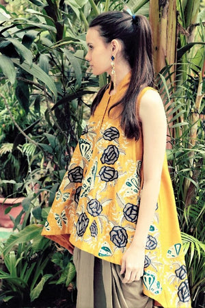 Buy mustard yellow embroidered silk butterfly jacket with dhoti pants online in USA. Stay updated with latest trends and styles with designer dresses, gowns, Indowestern dresses from Pure Elegance clothing store in USA or shop online.-side view