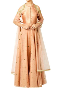 Shop peach cold shoulder raw silk Anarkali online in USA with churidaar. Shine with rich ethnic outfits at weddings and special occasions from Pure Elegance clothing store in USA. An exquisite collection of Indian designer dresses, wedding sarees, party dresses, and much more is waiting for you on online and in our store.-full view