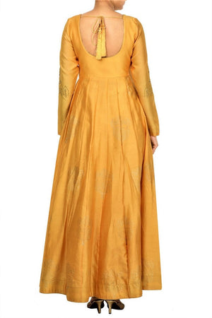 Buy online mustard floor length chanderi cape in USA at Pure Elegance. Make your festive collection exquisite with a range of Indian designer dresses, suits, Anarkali dresses from our exclusive clothing store in USA. You can also browse through our online store and shop online.-back
